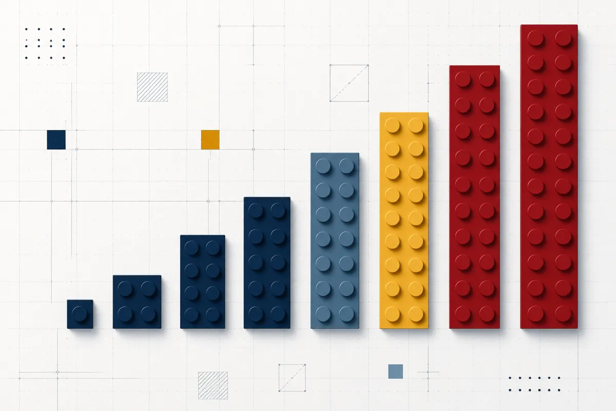 A bar chart made of stacked toy bricks in ascending heights against a blueprint-style background.